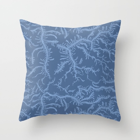 pillow with blue ferning pattern