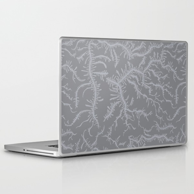 laptop skin with grey ferning pattern