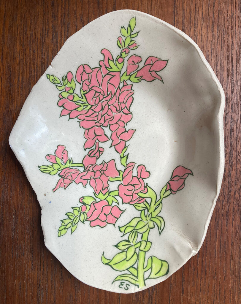 ceramic plate painted with snapdragon flowers